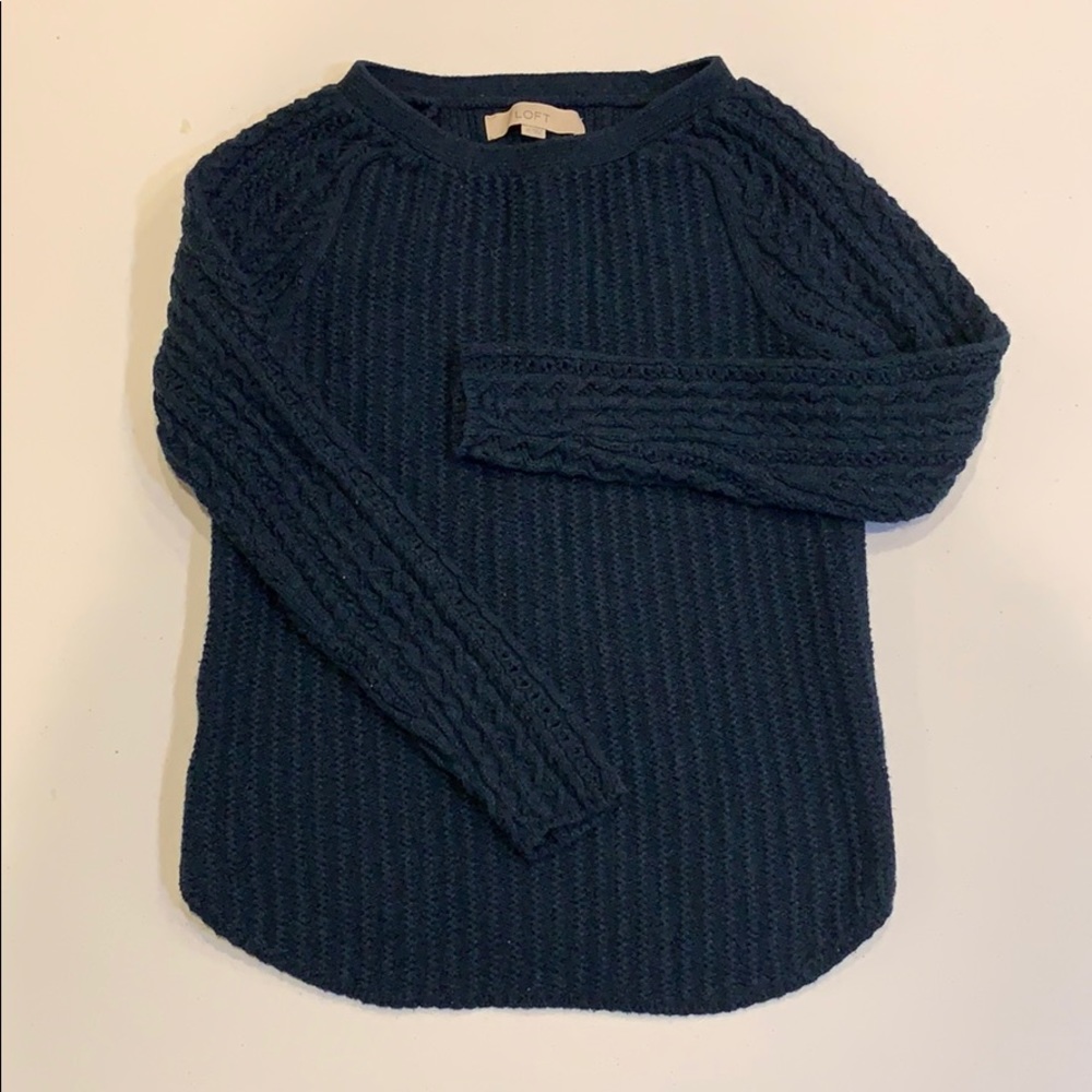 Navy blue cable knit sweater